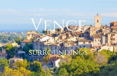 A view of Vence in the Cote d’Azur with mature trees in the foreground looking across to the old town with the Mediterranean sea in the distance.